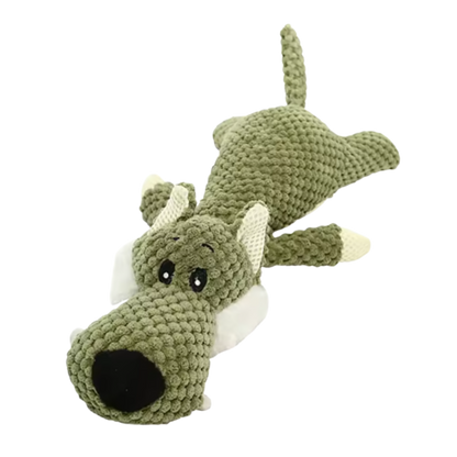 Hund tuggar på ChewChamp gosedjur